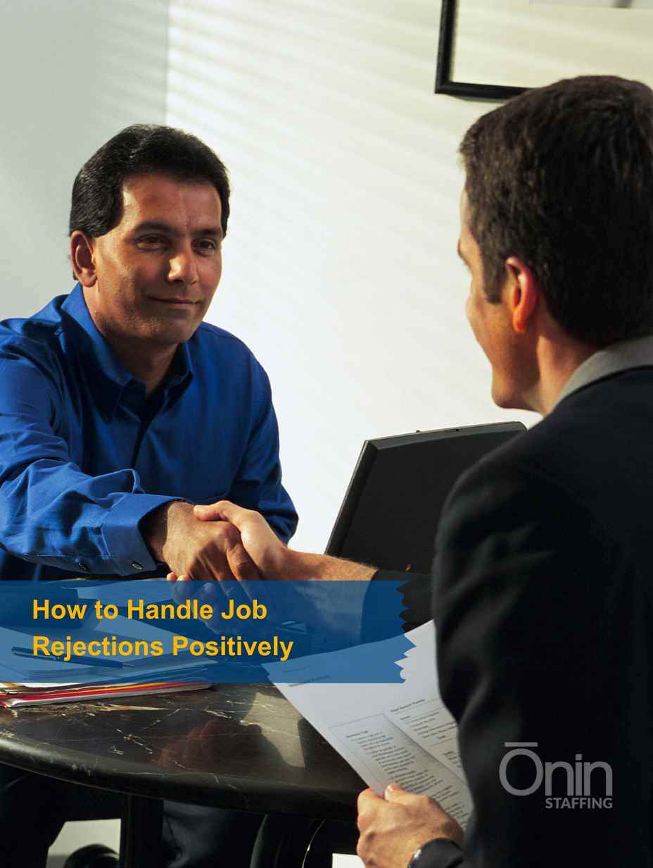 Two men sitting across from one another during a job interview